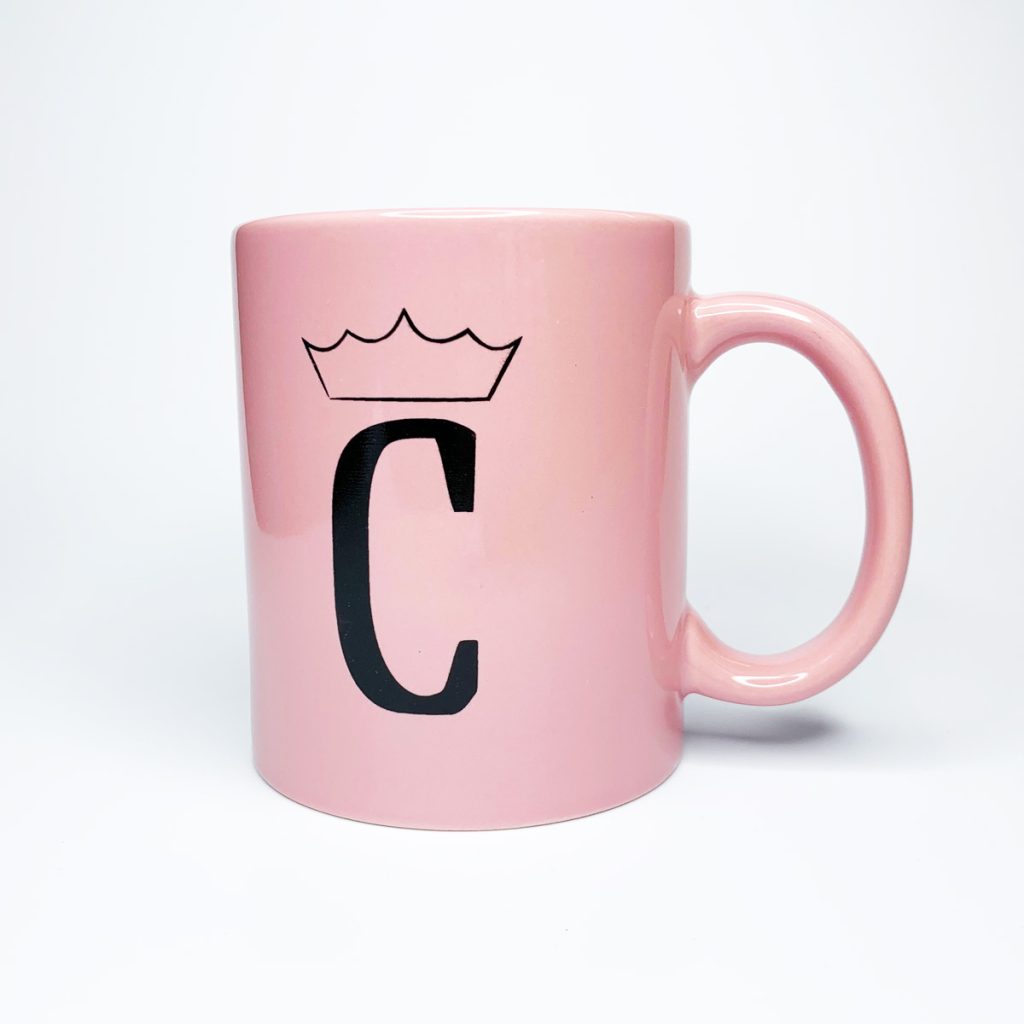 Pink mug featuring a C with a crown, for Phoenix restaurant The Coronado