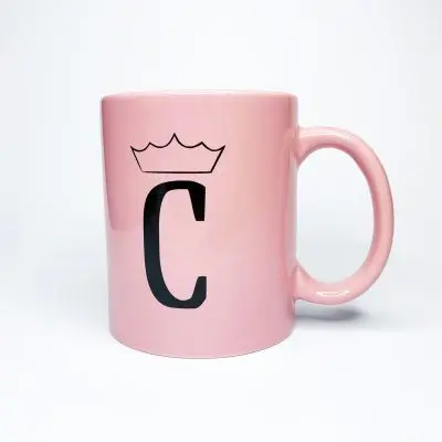 Pink mug featuring a C with a crown, for Phoenix restaurant The Coronado