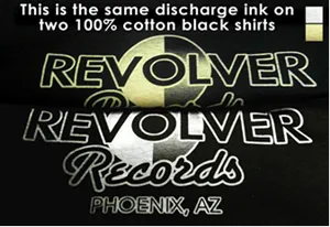 Two 100% cotton black shirts printed with white discharge ink. One has a yellow hue, the other is white. Both were printed with the same ink.